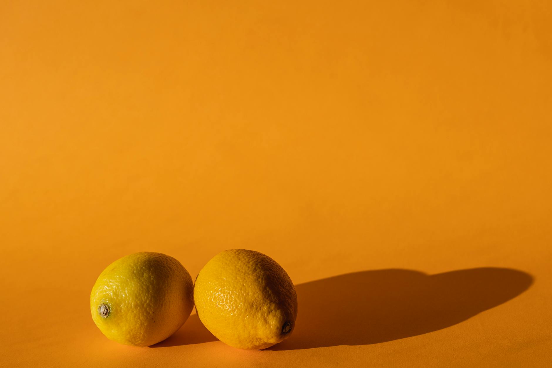 Yellow silicone vibrator on yellow background